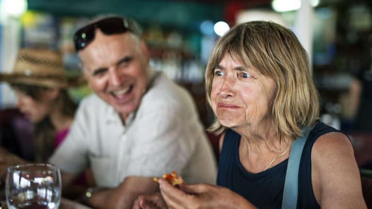 Annoyed woman eating