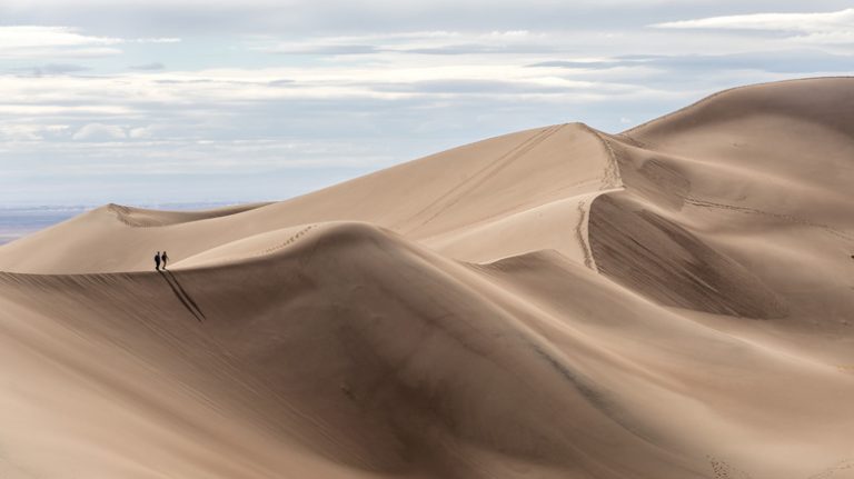 Hikers at the Great Sand Dunes National Park