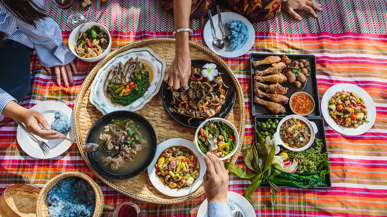 View from above of people enjoying Thai dishes