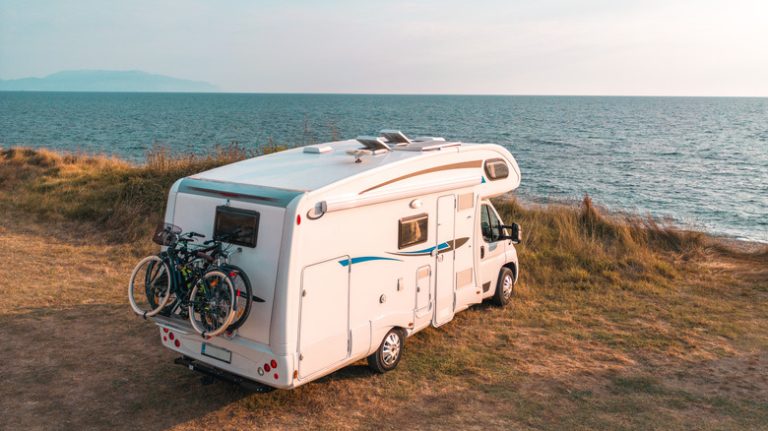 RV parked cliffside on West Coast