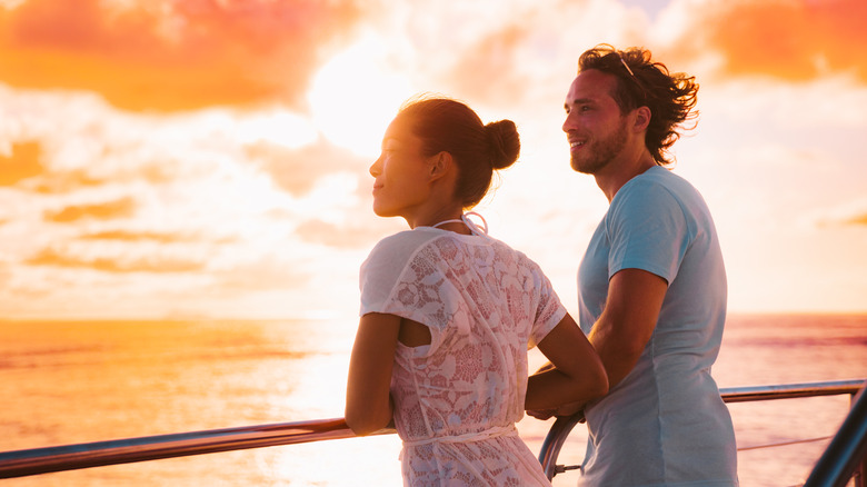 Couple at cruise railing