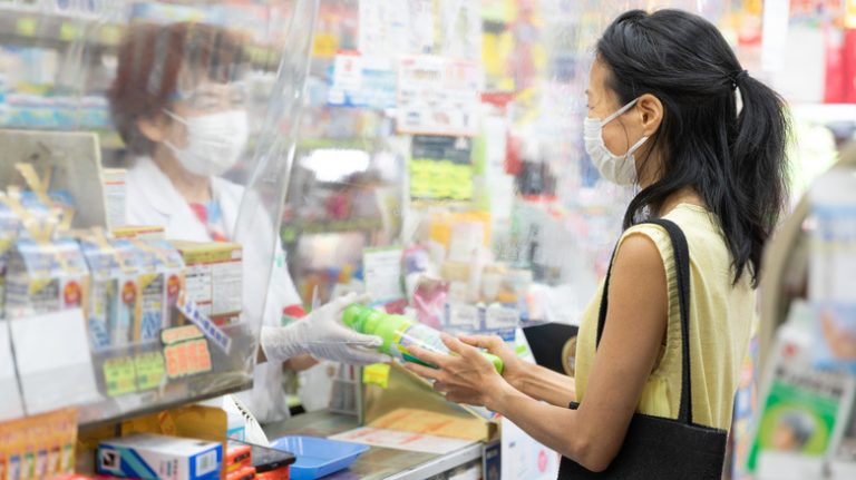 Japan pharmacy counter customer transaction