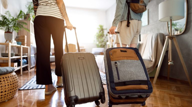 couple with luggage