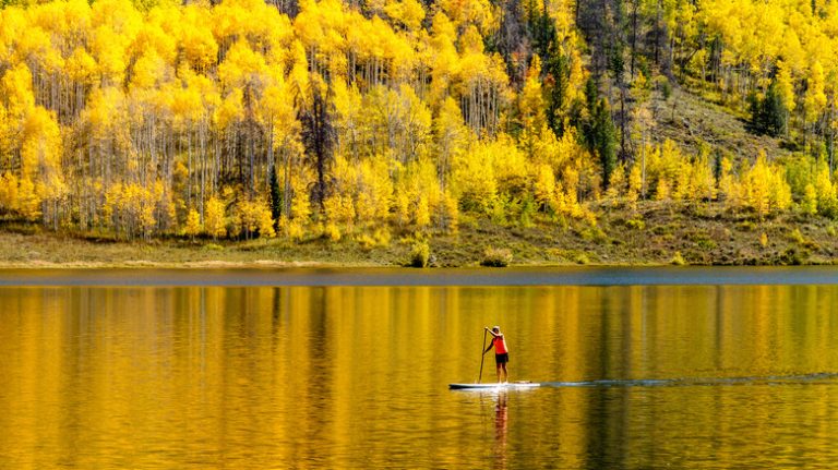 Woman paddleboarding on Pearl Lake