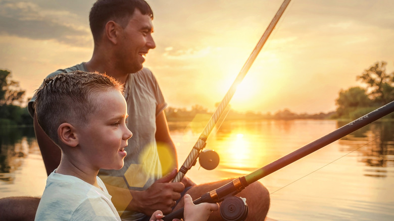 Father and son lake fishing