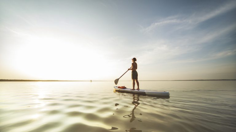 Woman paddle boarding