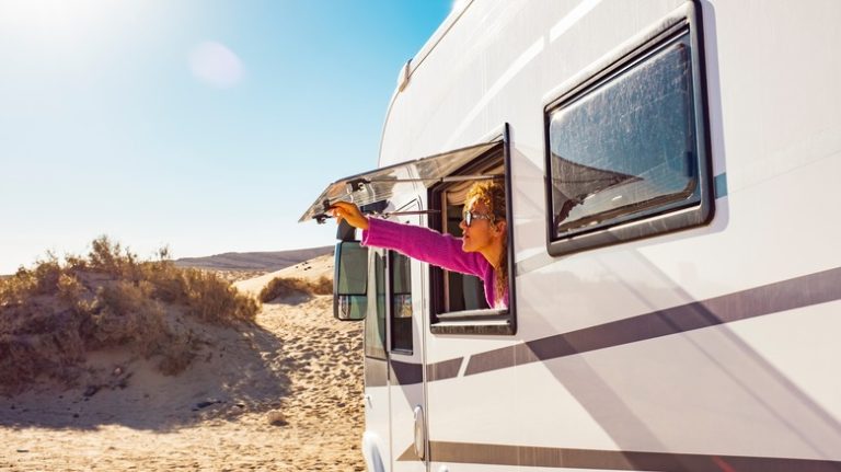 Woman opening RV window