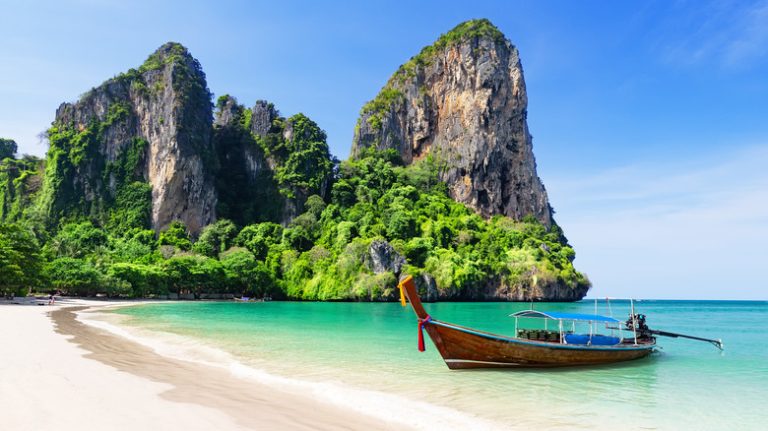 Longtail boat on the shore