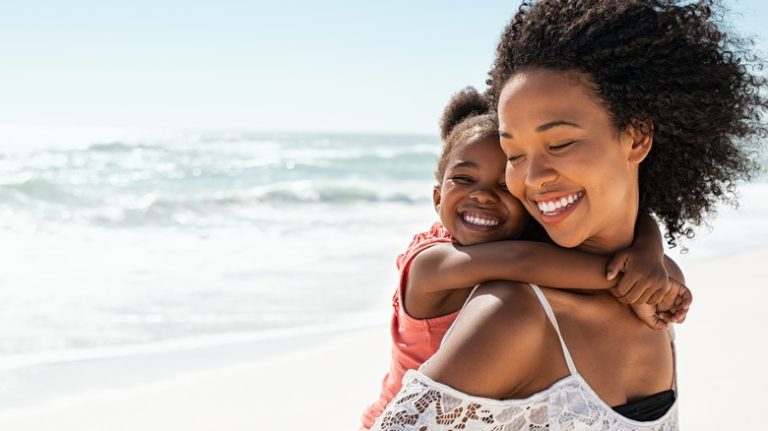 Mother and daughter on beach