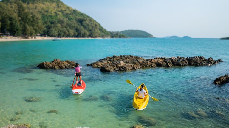 women kayaking at Thai beach