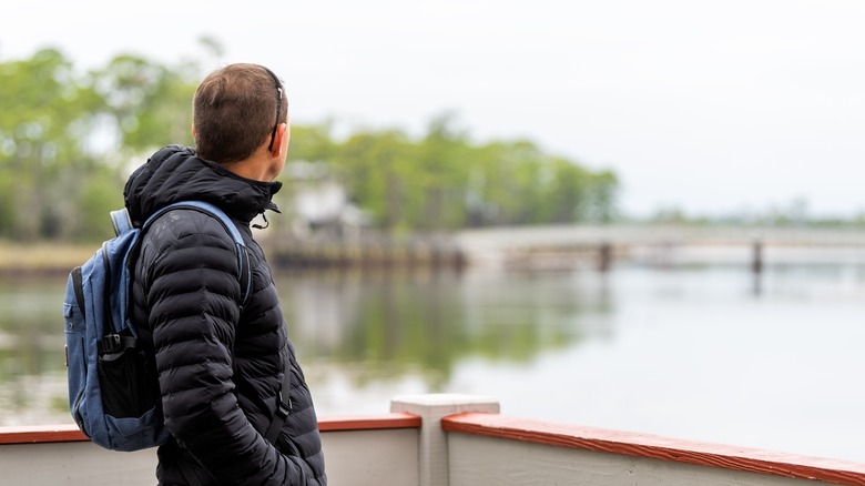 Man looking at Western Lake