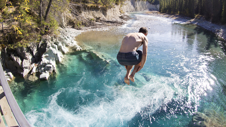 Man jumps into lake