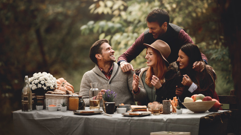 Friends enjoying local food