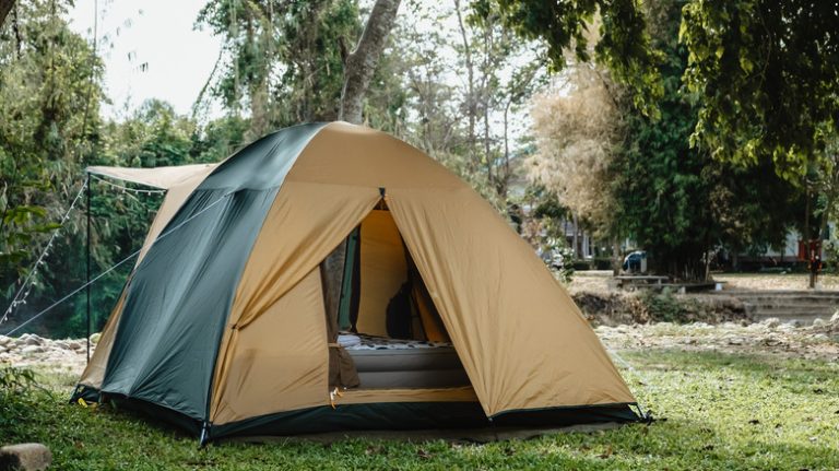 tan tent on grass