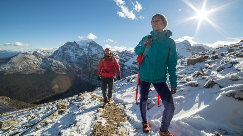 Winter hikers in bright sunshine