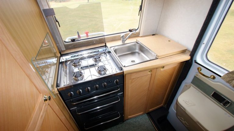 RV kitchen with cupboards