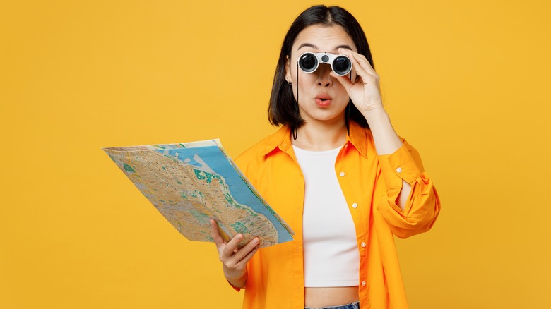 woman holding a map