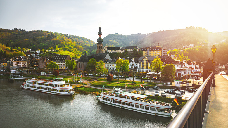 Riverboats stopped at scenic town