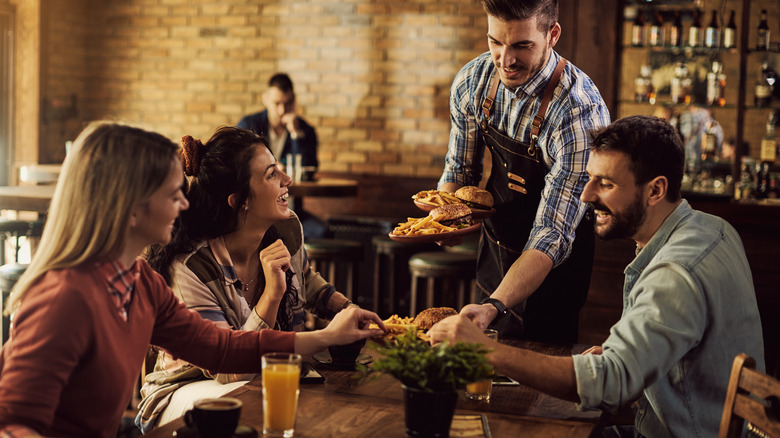 Friends eat in small pub