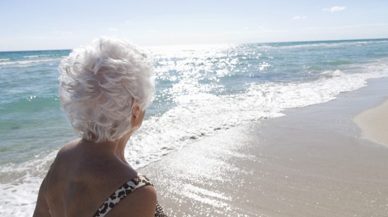 Person enjoy herself on beach