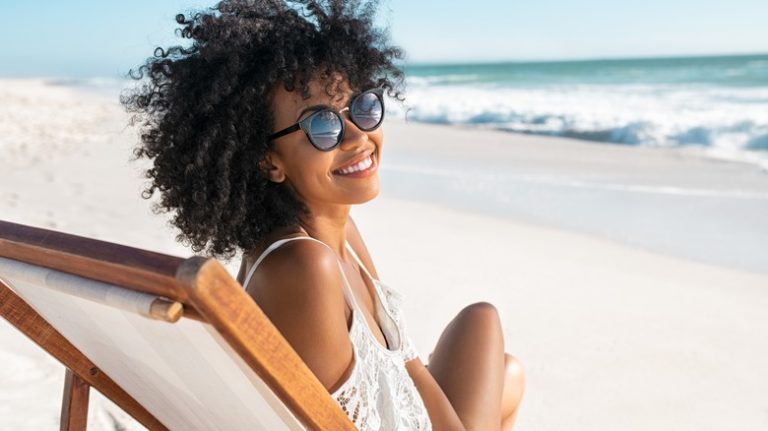 Woman sitting on a beach