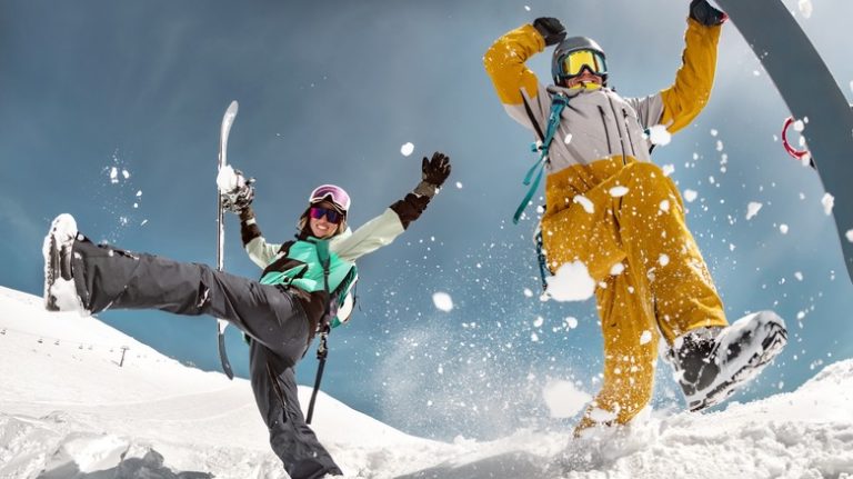 Happy snowboarders on the slopes