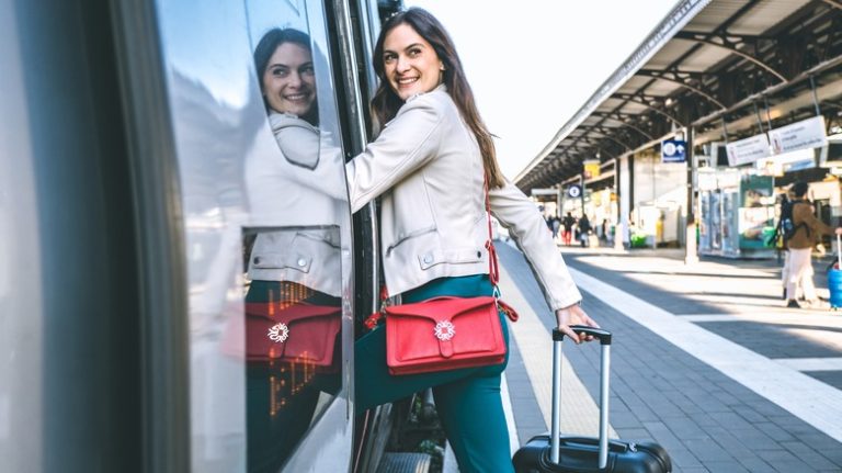 Woman boarding a train