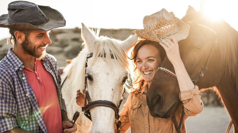 couple with two horses