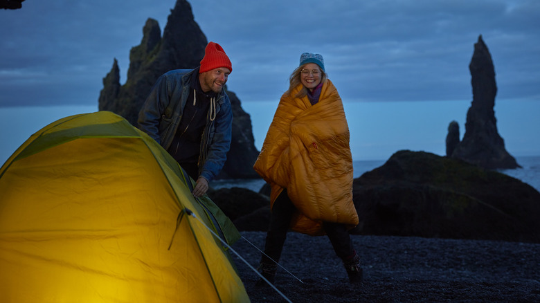 People camping at night