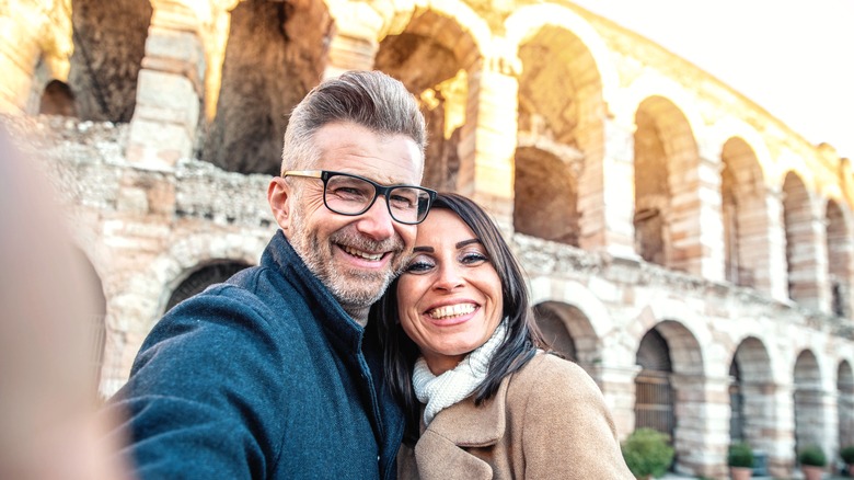 Taking a selfie at the Colosseum in Rome