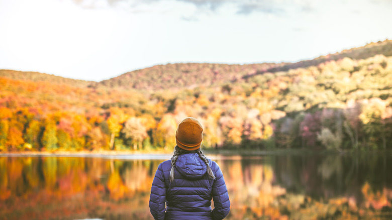 Woman looking at a lake