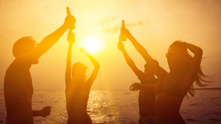 People dancing on the beach