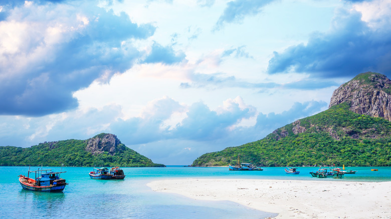 Beach with boats in Con Dao