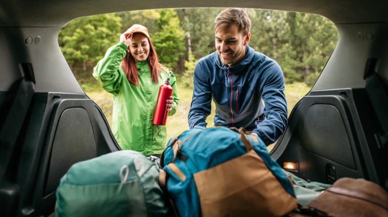 Couple packing car