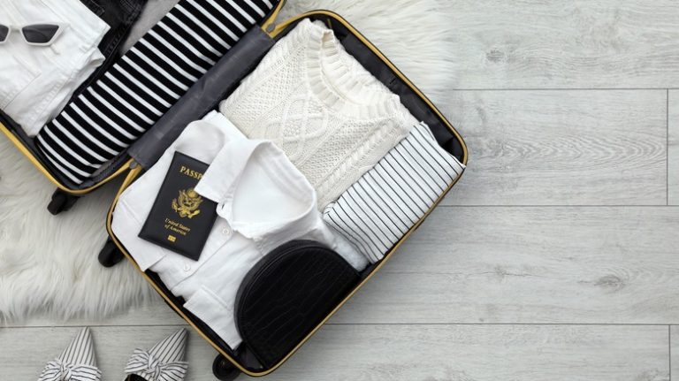 A suitcase with clothes, passport