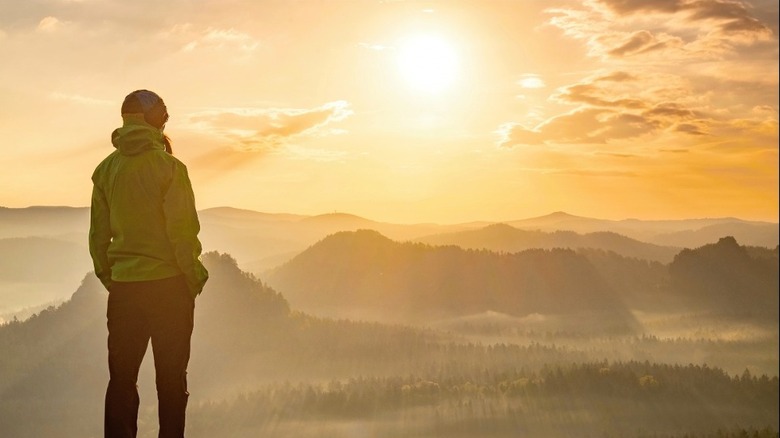 hiker surveying the landscape