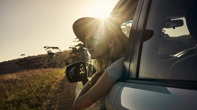 Solo woman driver in car