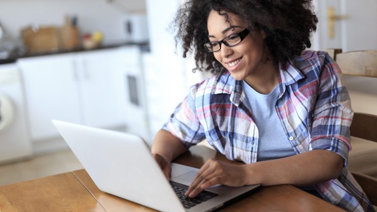 woman doing research on computer