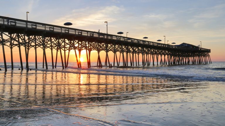 A pier at sunset in Myrtle Beach, SC