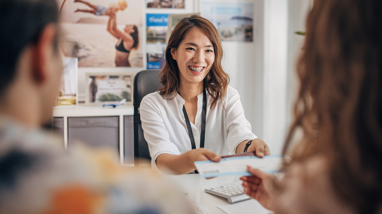 Couple working with a travel agent