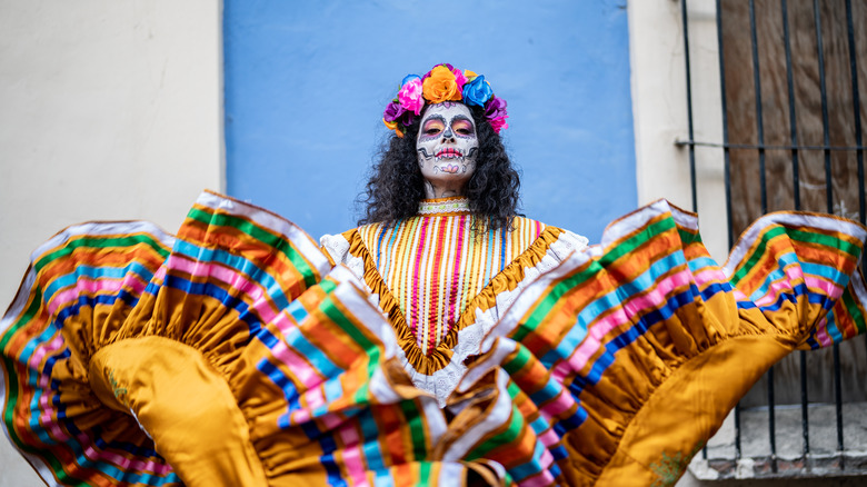 woman celebrating in traditional costume