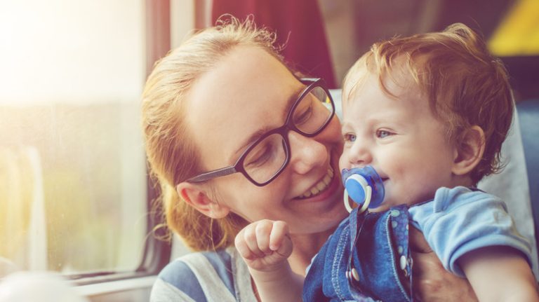 mother and son on train