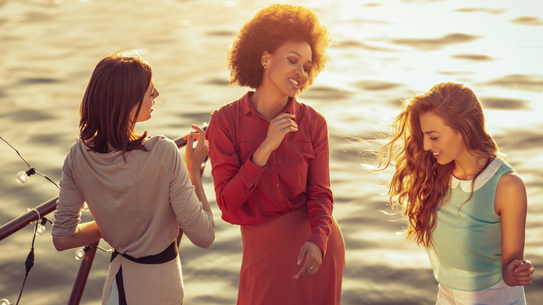 women dancing on cruise