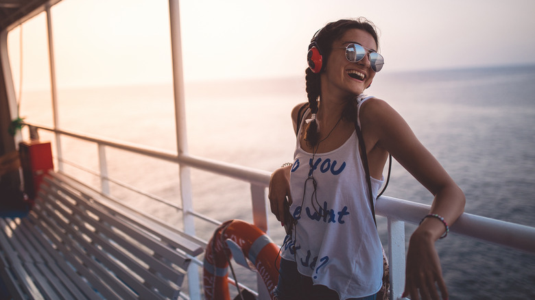 Happy woman on cruise ship