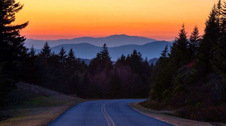 Sun setting in mountains