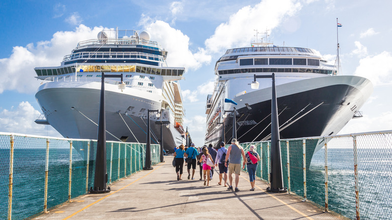 people boarding cruise ships