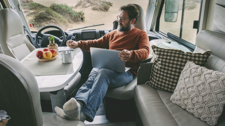 man relaxing in an RV