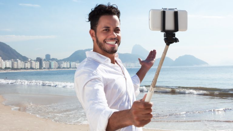 Man using selfie stick