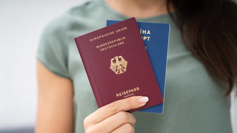 person with two passports