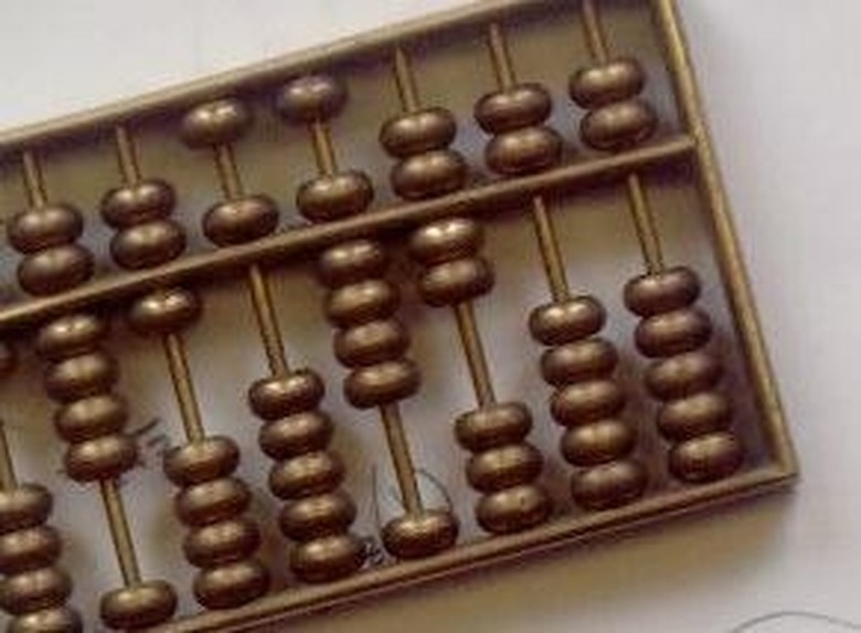 <h3>Using a Chinese Abacus</h3>